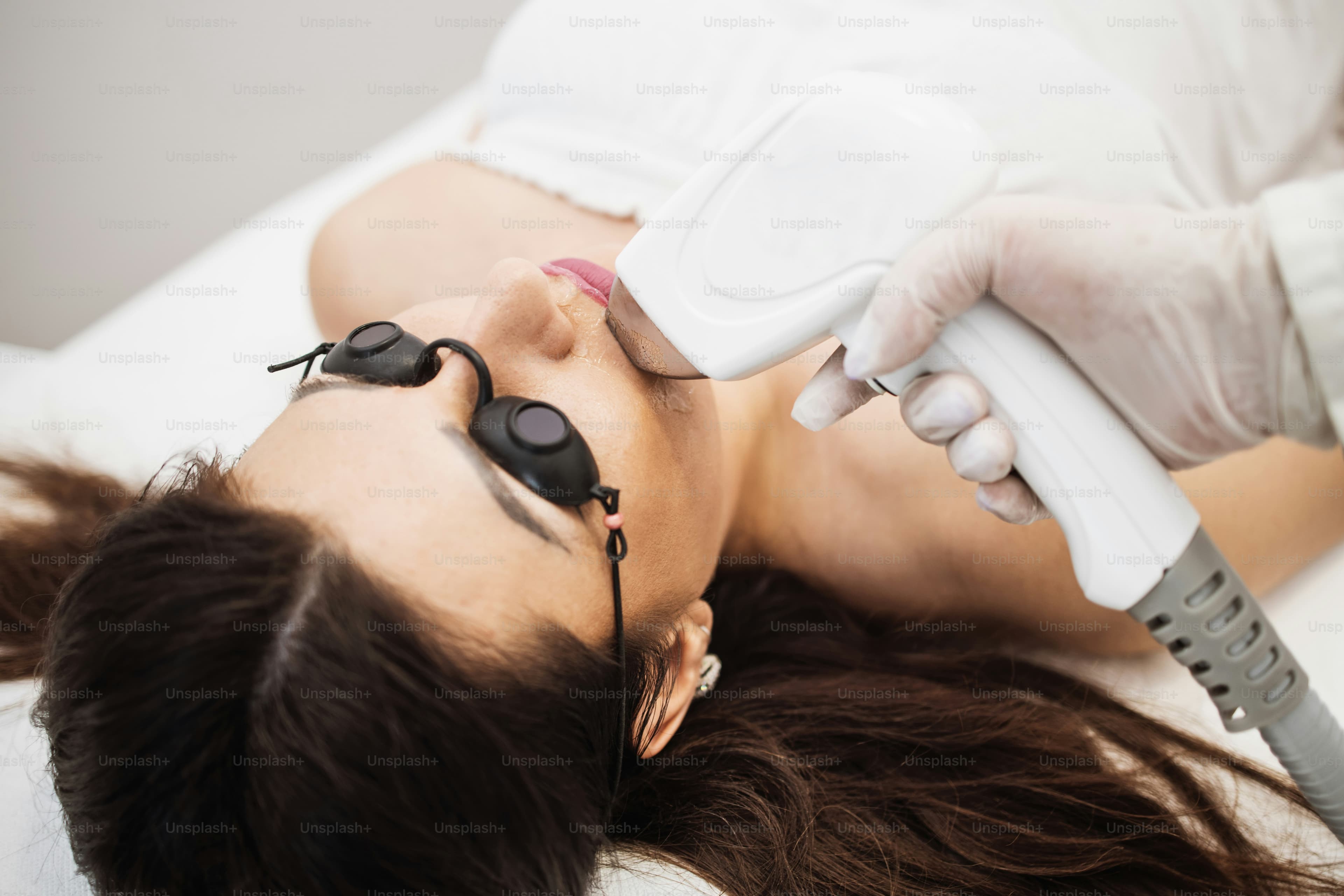 A laser hair removal machine in a treatment room